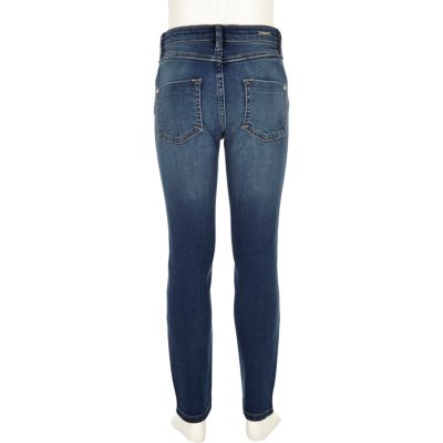 Girls mid blue wash ripped skinny jeans